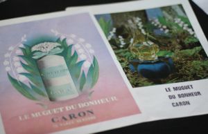 Quatre publicités pour le parfum "Le Muguet du bonheur" de Caron