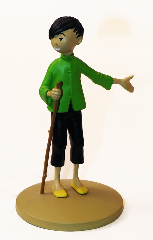 Figurine Tintin : 'Tchang indique Hou Kou' de l'album Le Lotus Bleu